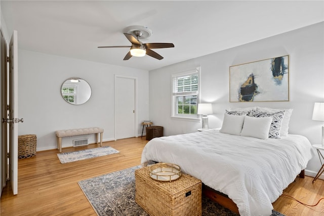 100 Carverdale Dr, Brighton, NY 14618 - bedroom featuring light wood-type flooring and ceiling fan