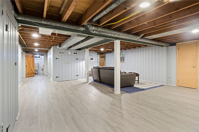 100 Carverdale Dr, Brighton, NY 14618 - finished basement featuring wood finished floors