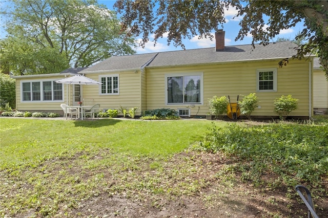 100 Carverdale Dr, Brighton, NY 14618 - back of house with a chimney and a lawn