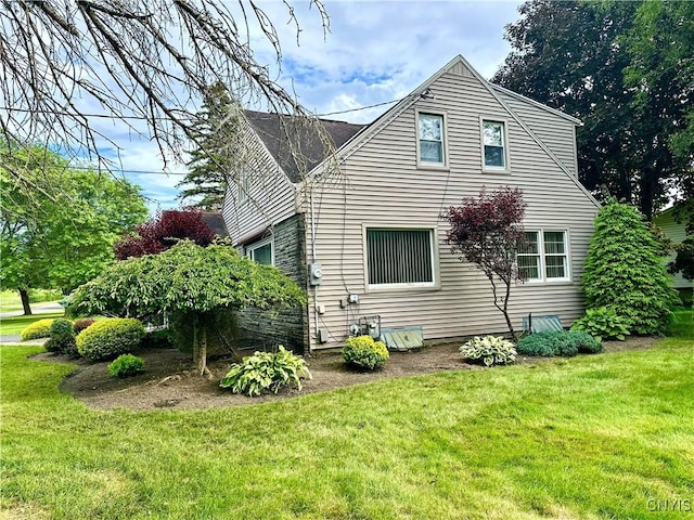 1000 Sherman Dr, Utica, NY 13501 - view of side of property featuring a yard