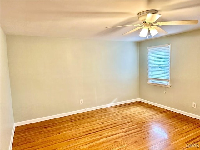 1000 Sherman Dr, Utica, NY 13501 - spare room with wood finished floors and ceiling fan