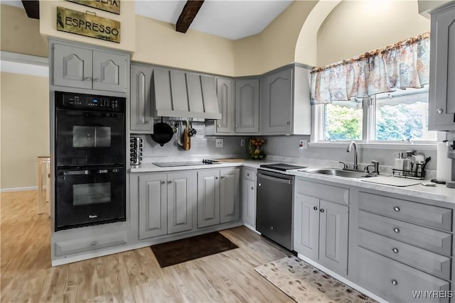 2503 Parkview Dr, Niagara Falls, NY 14305 - kitchen with black appliances, gray cabinets, light wood finished floors, and beamed ceiling