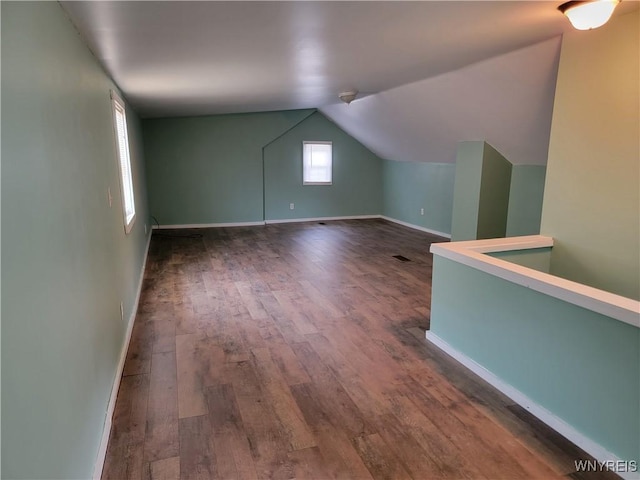 2255 Ontario Ave, Niagara Falls, NY 14305 - additional living space with dark wood finished floors and lofted ceiling