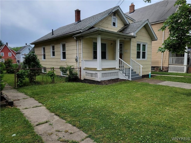 2255 Ontario Ave, Niagara Falls, NY 14305 - bungalow with a porch, a chimney, a shingled roof, and a gate