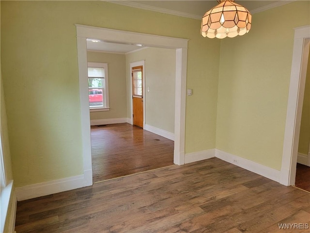 2255 Ontario Ave, Niagara Falls, NY 14305 - unfurnished dining area featuring crown molding and dark wood-style floors