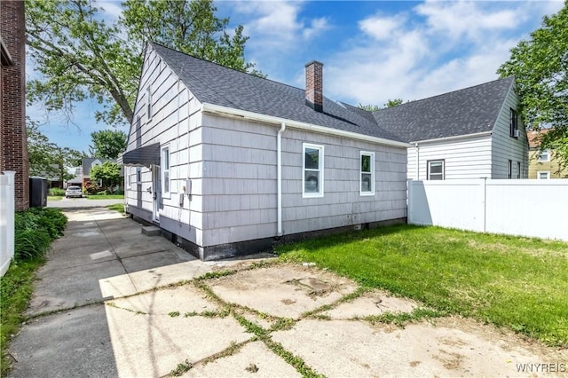 192 Culver Rd, Buffalo, NY 14220 - rear view of house featuring a chimney and roof with shingles