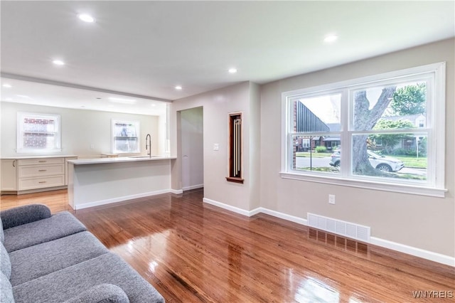 192 Culver Rd, Buffalo, NY 14220 - living room with light wood-style floors and recessed lighting