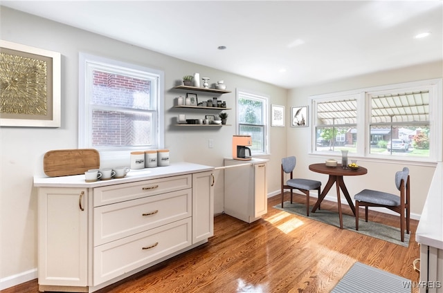192 Culver Rd, Buffalo, NY 14220 - bar featuring light wood-style flooring and baseboards