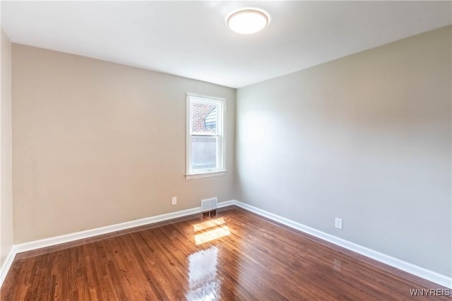 192 Culver Rd, Buffalo, NY 14220 - spare room with baseboards and wood finished floors