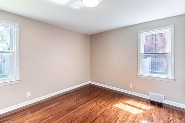 192 Culver Rd, Buffalo, NY 14220 - spare room featuring wood finished floors and plenty of natural light
