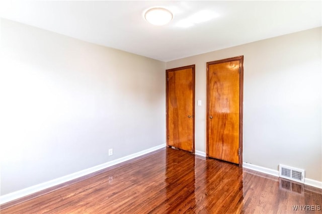 192 Culver Rd, Buffalo, NY 14220 - unfurnished bedroom with wood finished floors and baseboards