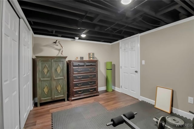 6290 Emily Ct, Clarence, NY 14032 - workout room with wood finished floors and baseboards