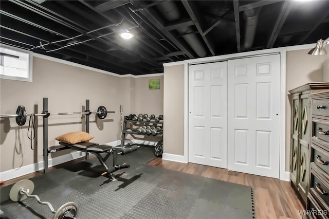 6290 Emily Ct, Clarence, NY 14032 - workout area featuring wood finished floors and baseboards