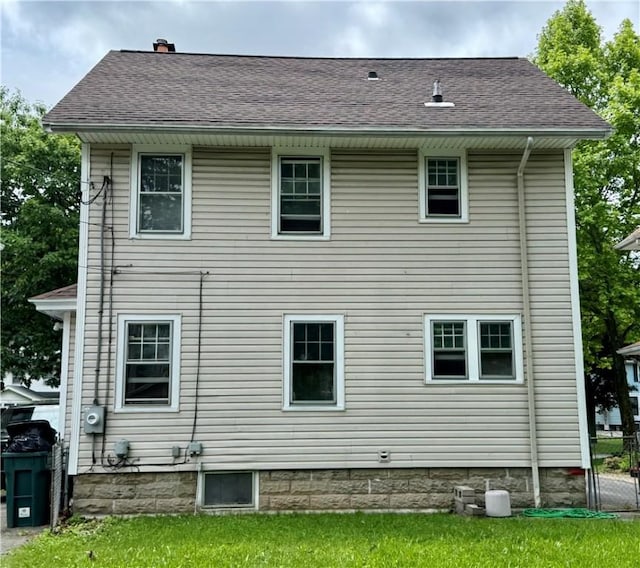 714 Arnett Blvd, Rochester, NY 14619 - rear view of property featuring roof with shingles