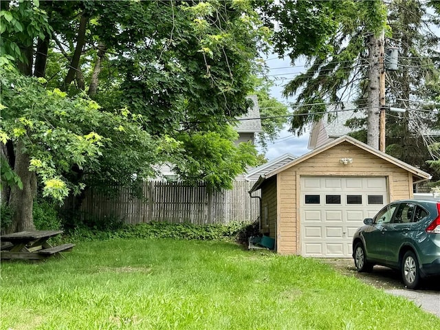 714 Arnett Blvd, Rochester, NY 14619 - detached garage featuring driveway