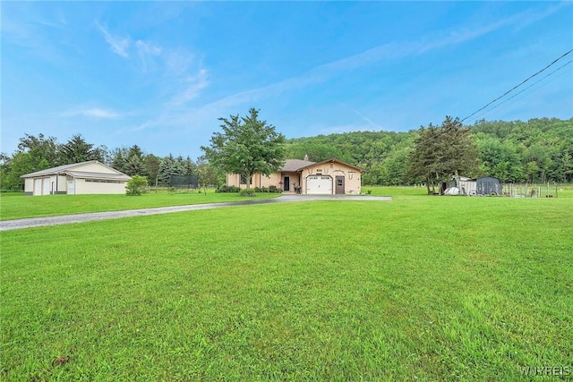 6557 Boberg Rd, Ashford, NY 14171 - view of grassy yard featuring asphalt driveway