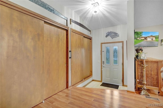 6557 Boberg Rd, Ashford, NY 14171 - entrance foyer featuring light wood finished floors and baseboards