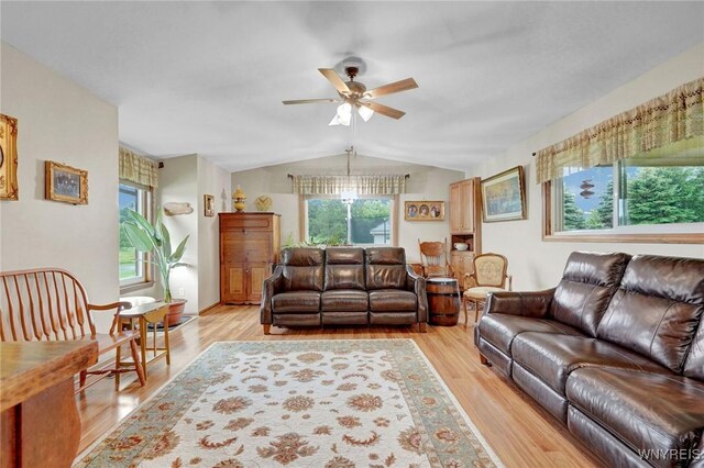 6557 Boberg Rd, Ashford, NY 14171 - living area featuring ceiling fan, lofted ceiling, and light wood finished floors