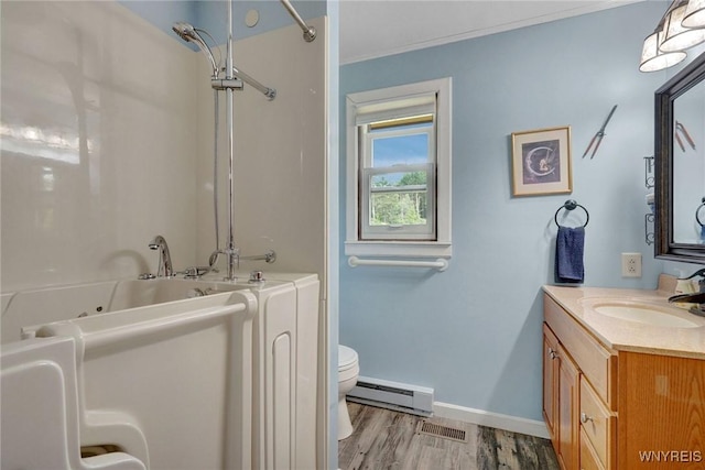 6557 Boberg Rd, Ashford, NY 14171 - bathroom featuring a baseboard heating unit, vanity, wood finished floors, and a combined bath / shower with jetted tub