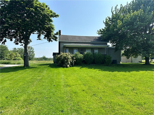14918 Lakeshore Rd, Carlton, NY 14477 - back of property with a lawn and a chimney