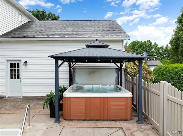 109 Hunt Valley Rd, Oneida-Inside, NY 13421 - view of patio / terrace featuring a hot tub and a gazebo