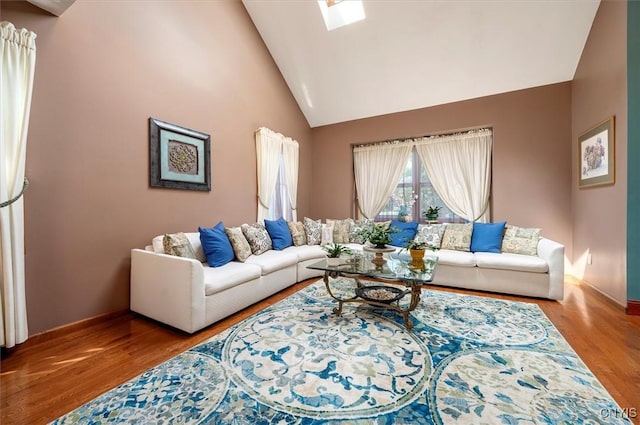 109 Hunt Valley Rd, Oneida-Inside, NY 13421 - living room featuring wood finished floors, a skylight, and high vaulted ceiling