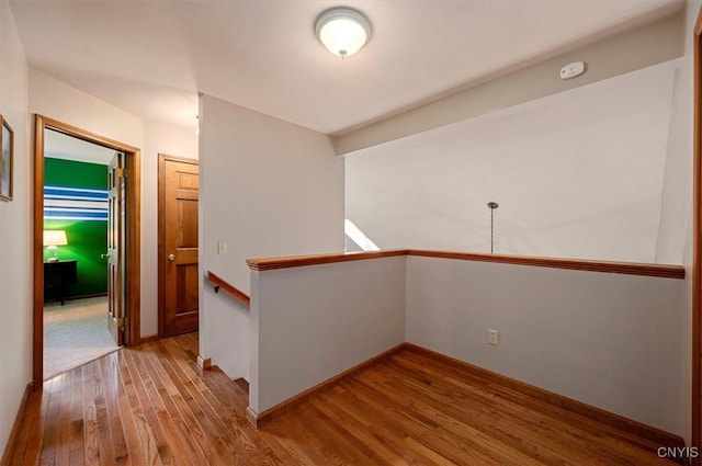 109 Hunt Valley Rd, Oneida-Inside, NY 13421 - hall with wood-type flooring and an upstairs landing