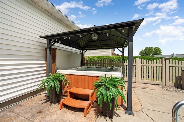 109 Hunt Valley Rd, Oneida-Inside, NY 13421 - view of patio with a hot tub and a gazebo