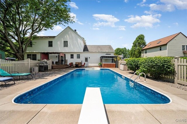 109 Hunt Valley Rd, Oneida-Inside, NY 13421 - view of pool with a patio, a diving board, a deck, area for grilling, and a gazebo