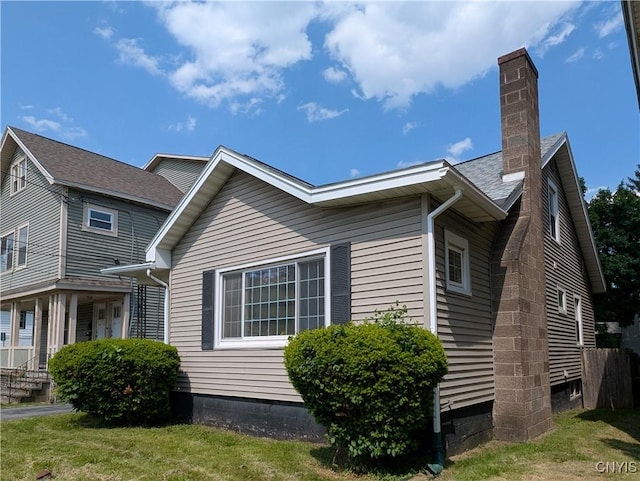 305 S Midler Ave, Syracuse, NY 13206 - view of home's exterior featuring a chimney