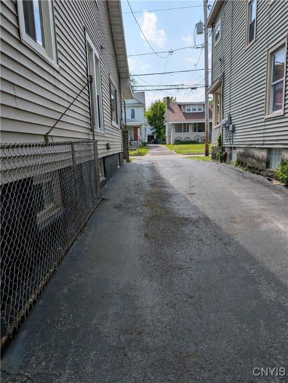 305 S Midler Ave, Syracuse, NY 13206 - view of asphalt road featuring a residential view