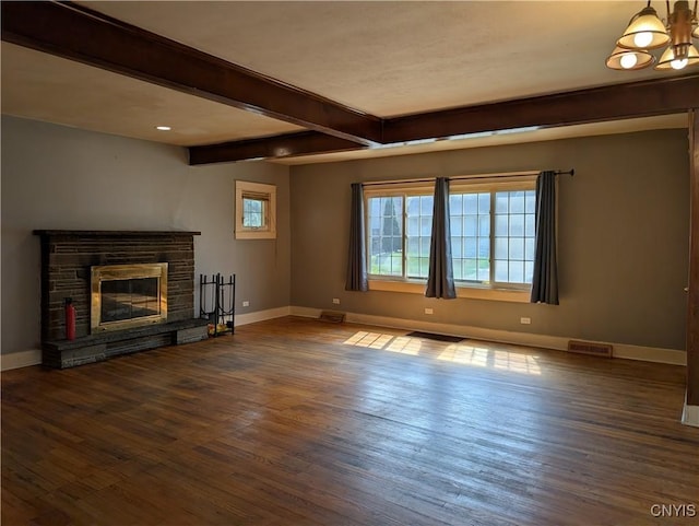 305 S Midler Ave, Syracuse, NY 13206 - unfurnished living room with wood finished floors, a chandelier, beam ceiling, a stone fireplace, and recessed lighting