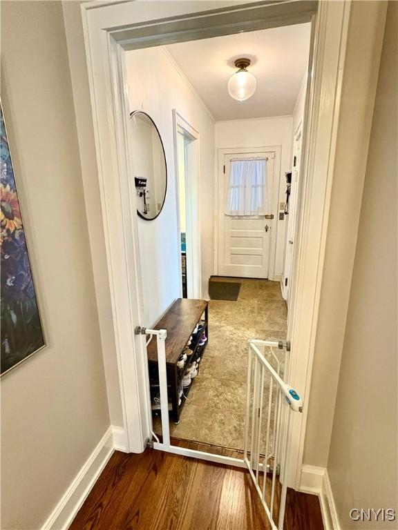 308 Haddonfield Dr, Dewitt, NY 13214 - hall featuring dark wood finished floors and ornamental molding