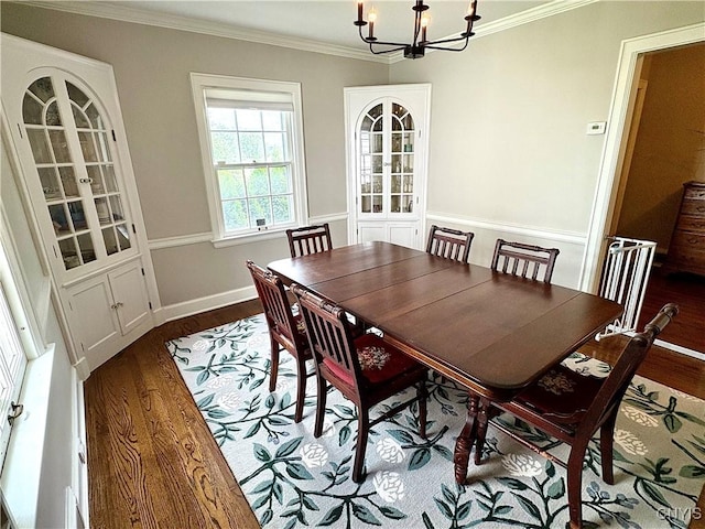 308 Haddonfield Dr, Dewitt, NY 13214 - dining space with a chandelier, wood finished floors, and ornamental molding