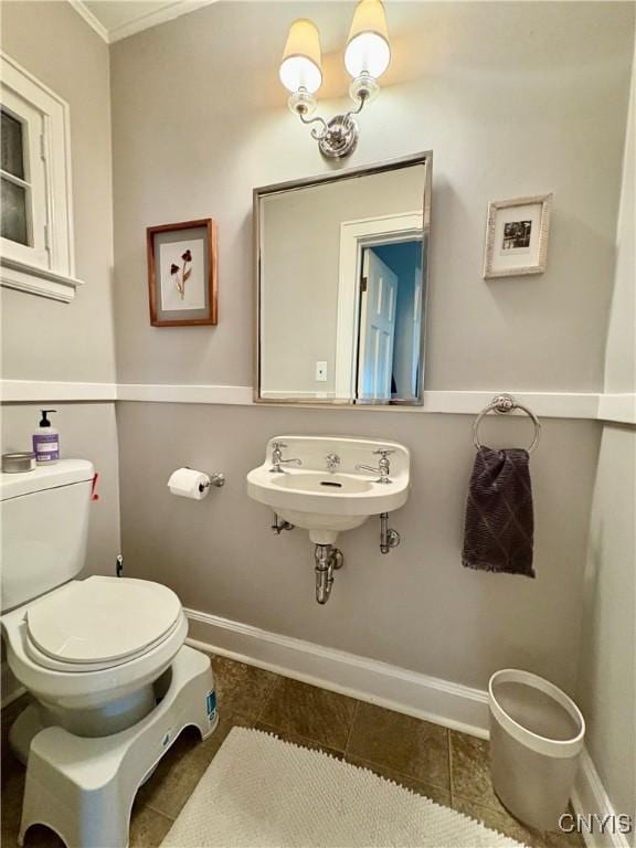 308 Haddonfield Dr, Dewitt, NY 13214 - half bath featuring ornamental molding and tile patterned flooring