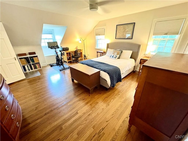 308 Haddonfield Dr, Dewitt, NY 13214 - bedroom with light wood-type flooring, lofted ceiling, and ceiling fan