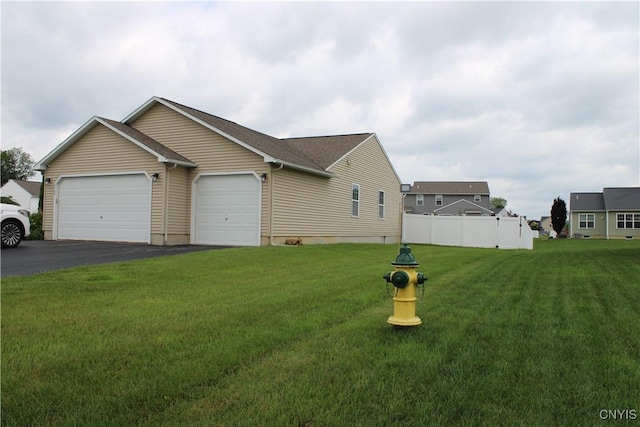 4745 Lynnville, Clay, NY 13041 - view of front of house with a garage and driveway