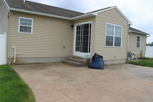 4745 Lynnville, Clay, NY 13041 - back of house featuring entry steps and a patio area