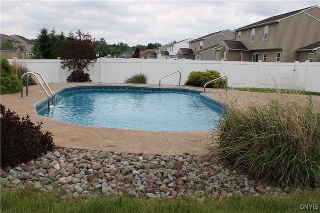 4745 Lynnville, Clay, NY 13041 - view of swimming pool featuring a residential view and a fenced backyard