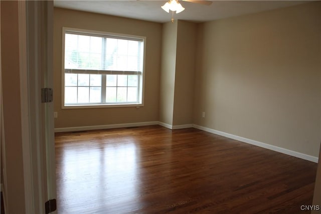 4745 Lynnville, Clay, NY 13041 - spare room featuring dark wood finished floors and ceiling fan