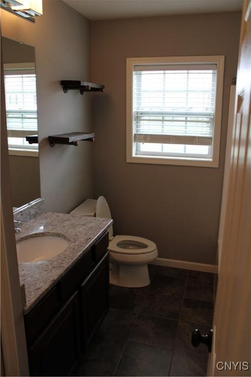 4745 Lynnville, Clay, NY 13041 - half bathroom featuring plenty of natural light, vanity, and tile patterned floors