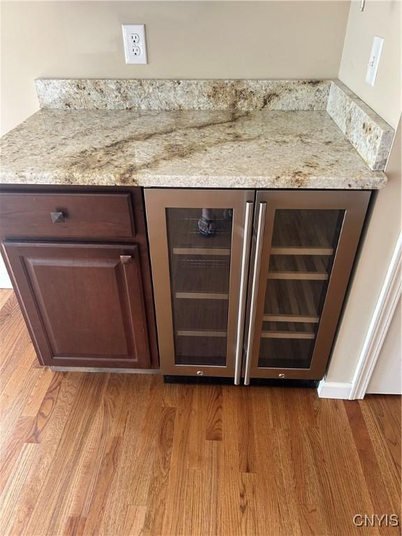 4745 Lynnville, Clay, NY 13041 - detailed view of wood finished floors and wine cooler