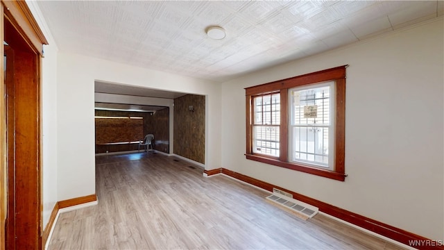 133 Freund St, Buffalo, NY 14215 - empty room with baseboards and wood finished floors