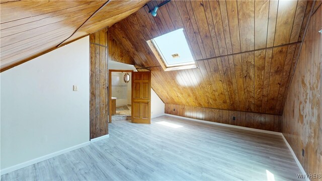 133 Freund St, Buffalo, NY 14215 - additional living space with vaulted ceiling, a skylight, wood ceiling, light wood finished floors, and wooden walls