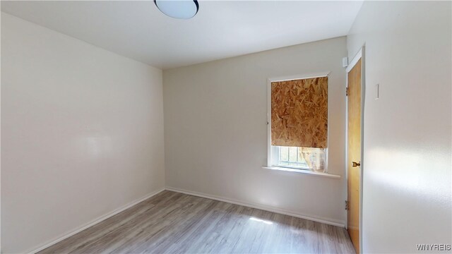 133 Freund St, Buffalo, NY 14215 - unfurnished room featuring wood finished floors and baseboards