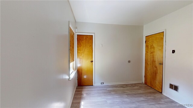 133 Freund St, Buffalo, NY 14215 - spare room with light wood-type flooring and baseboards