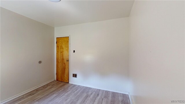 133 Freund St, Buffalo, NY 14215 - empty room featuring light wood-style floors and baseboards