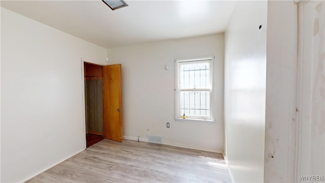 133 Freund St, Buffalo, NY 14215 - unfurnished bedroom with light wood-style floors and baseboards