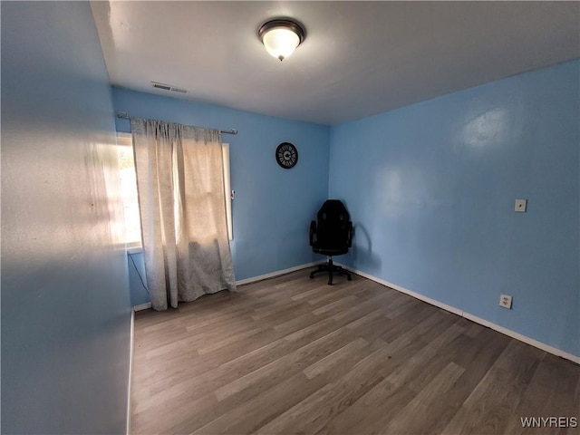 196 Kilhoffer St Unit B, Buffalo, NY 14211 - empty room with wood finished floors and baseboards