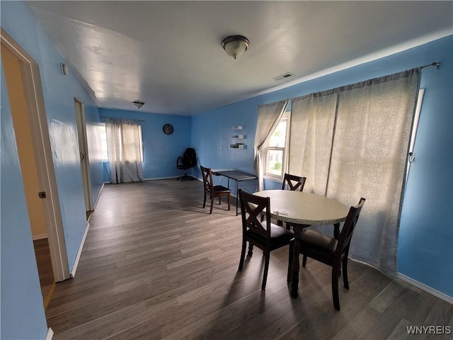 196 Kilhoffer St Unit B, Buffalo, NY 14211 - dining room featuring healthy amount of natural light and wood finished floors
